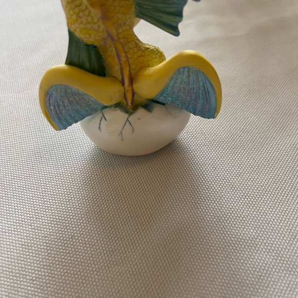 Adorable little dragon holding a blue gem. Approximately 3 inches. - Picture 2 of 4